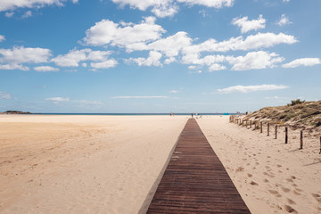 Fototapeta na wymiar CHIA, SARDINIA / OCTOBER 2019: The beautiful white sand beach of Chia, south of Sardinia