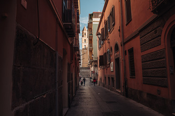 Fototapeta na wymiar CAGLIARI, ITALY /OCTOBER 2019: Street life in the old town