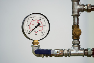 Pressure gauge psi meter on white background with copy space
