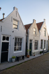 Street view in small Dutch town Goedereede on sunset, Zeeland, Netherlands