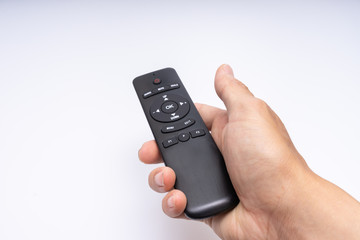  Hand holding a remote control