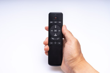  Hand holding a remote control