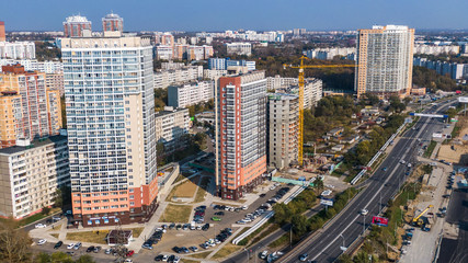 Fototapeta na wymiar Khabarovsk shopping center Brosko mall the view from the top. filmed with a drone. amur river. residential complex pioneer