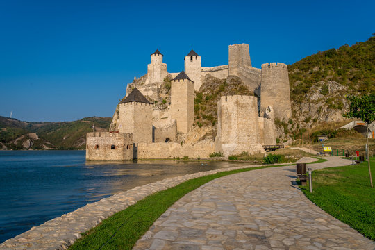 Summer afternoon view of restored medieval Golubac fortress, trdava Golubac  on the bank of the Danube in Serbia for Yugoslavia across from Romania major tourist destination