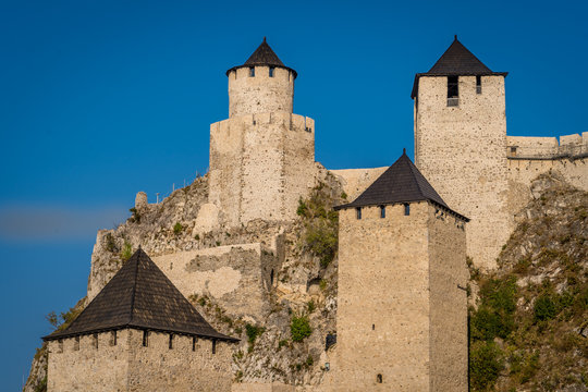 Summer afternoon view of restored medieval Golubac fortress, trdava Golubac  on the bank of the Danube in Serbia for Yugoslavia across from Romania major tourist destination