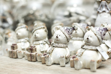 holiday christmas decoration. Shelf with figures of toy white bears. Little things that create a Christmas mood.