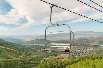 Chairlift and aerial view of a ski resort in Park City during off season months