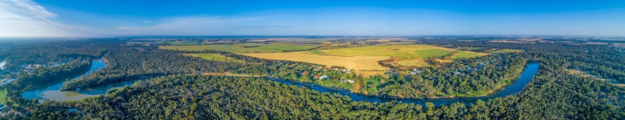 Fototapeta na wymiar Wide aerial panorama of long stretch of Murray River in scenic countryside