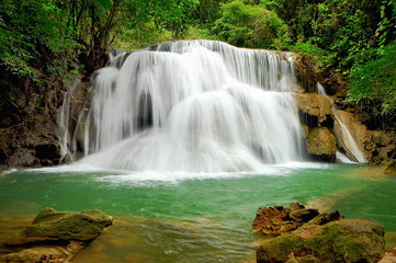 Fototapeta na wymiar Huay Mae Kamin is a beautiful waterfall in Thailand. Beautiful waterfall.Abundant tropical forest.