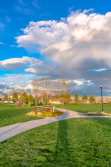 Footpath through a rural park at sunset