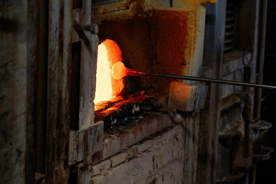 Murano factory. Murano Italy Glass Blowing Furnace, Kiln. Traditional Italian craftsmanship concept. inside Murano glass factory Venice Italy close up detail