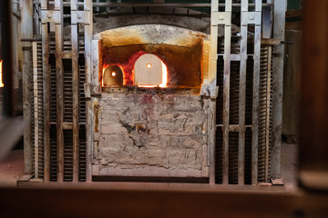 Murano factory. Murano Italy Glass Blowing Furnace, Kiln. Picture from glass blower factory , Glassworks glass manufacturing process. Traditional Italian craftsmanship concept. Venice, Italy