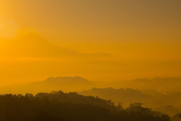 Misty sunrise over a valley