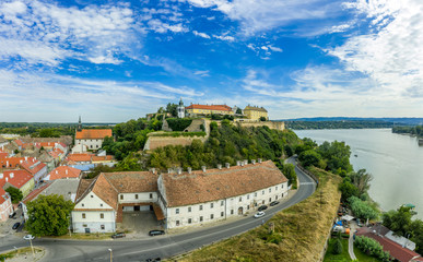 Aerial panorama view of Petrovaradin fortress trdava above the Danube River across from Novi Sad Serbia with beautiful blue sky