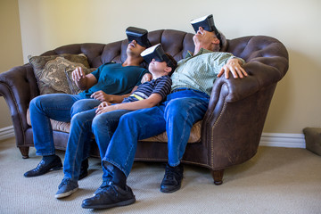 Multigeneration Family playing with virtual reality  at the holidays