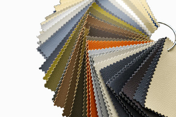 A catalog with samples of genuine leather materials in different colors for the manufacture of...