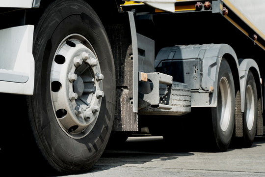 Wheels of the semi truck trailer, freight industry transport