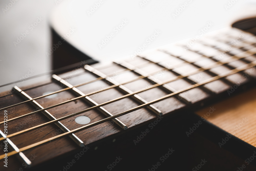 Wall mural modern acoustic guitar, closeup view