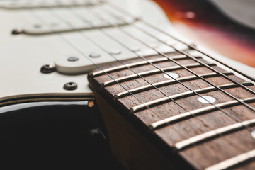 Modern bass guitar, closeup view