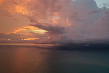 Storm at sunset over ocean 