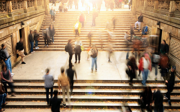 Overhead View Of People Climbing Stairs In Central Park, New York City With Bright Shining Sunlight