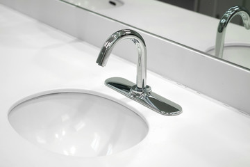 close up on stainless sink in bathroom