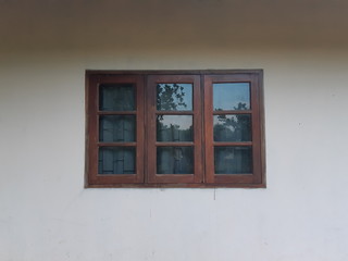 window on white wall