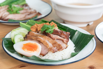 Rice with roasted pork, crispy pork, egg and vegetables