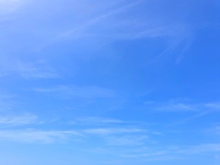 Beautiful nature of blue sky and clouds with the sun shining in the morning, sky background, cloudscape concept, Looking up