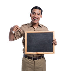 happy young asian worker with brown uniform holding blank chalkboard isolated over white background