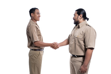 two team indonesian government worker shaking hand together isolated over white
