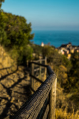 Fence in the mountain with the sea behind