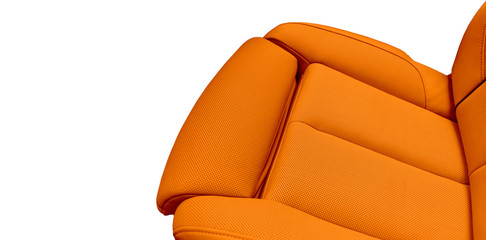 Orange leather interior of the luxury modern car. Perforated brown leather comfortable seats with stitching isolated on white background. Modern car interior details. Car detailing. Car inside