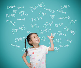 Asian child girl pointing at the blackboard with imagination the formulas and mathematics, Creative...