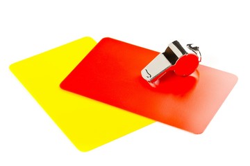 Soccer sports referee yellow and red cards with chrome whistle on white background