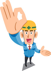 手でOKのサインを示し案内する青い作業着を着た建築現場作業員