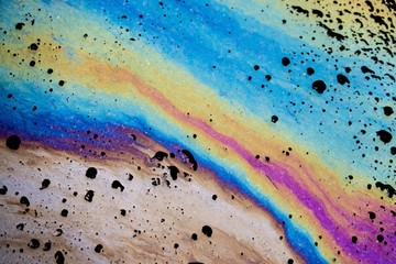 Fototapeta na wymiar Slick industry oil fuel spilling water, abstract background