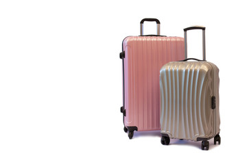 Pink and gray luggage trolley bag side isolated on white background, Compact plastic travel bag. Travel plan, trip vacation, tourism.