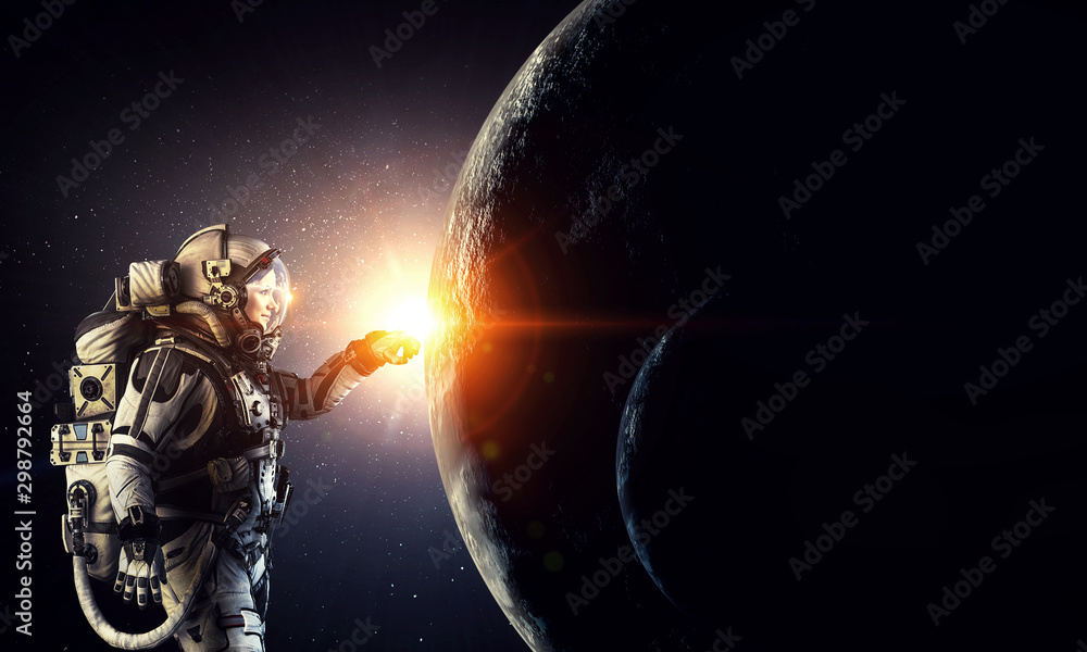 Wall mural exploring outer space. mixed media
