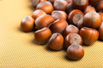 Obraz premium close up of hazelnuts on table .