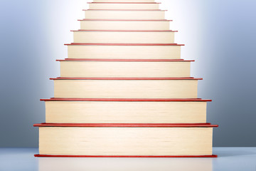 Book Steps Leading to learning, success, knowledge.  Education and growth concept.