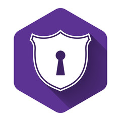 White Shield with keyhole icon isolated with long shadow. Protection and security concept. Safety badge icon. Privacy banner. Defense tag. Purple hexagon button. Vector Illustration