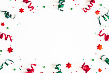 Christmas composition. Ribbon decorations on white background. Christmas, winter, new year concept. Flat lay, top view, copy space