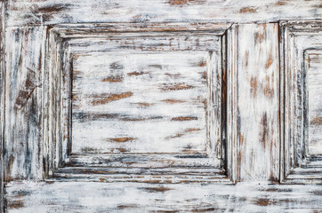 Vintage wooden background with faded peeling white paint. Old wooden painted texture surface.