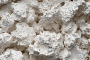 Fototapeta na wymiar Chunky Calcium Chloride - white dehumidifying material.