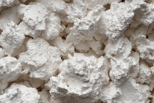 Chunky Calcium Chloride - white dehumidifying material.