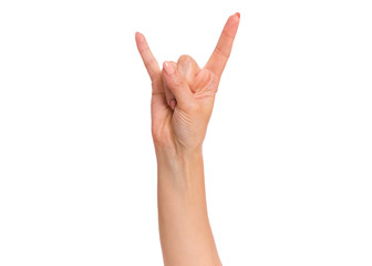 Female hand showing heavy metal Rock gesture, isolated on white background. Beautiful hand of woman with copy space. Hand pointing two fingers.