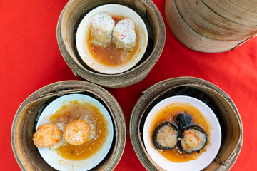 Close up dim sum chinese food in bamboo basket