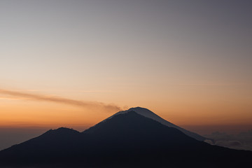 Batur volcano sunrise in the clouds Bali Indonesia