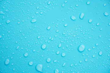 Water drops on blue background.